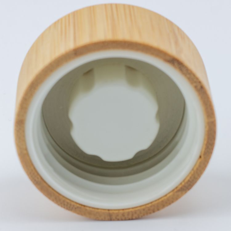 Small mouth glass bottle with bamboo lid